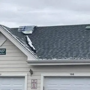 Condo roof with new shingles and roofing materials for repair, illustrating the importance of HO6 condo insurance coverage for multifamily property owners, Elite Roofing & Solar.