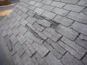 Damaged asphalt shingles