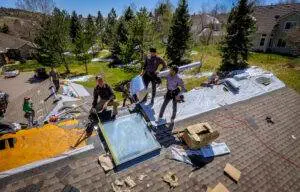Elite Roofing & Solar completing a roof replacement in Denver, CO