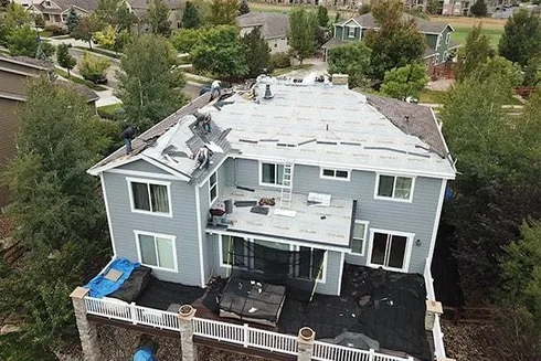 roof replacement by Elite Roofing.